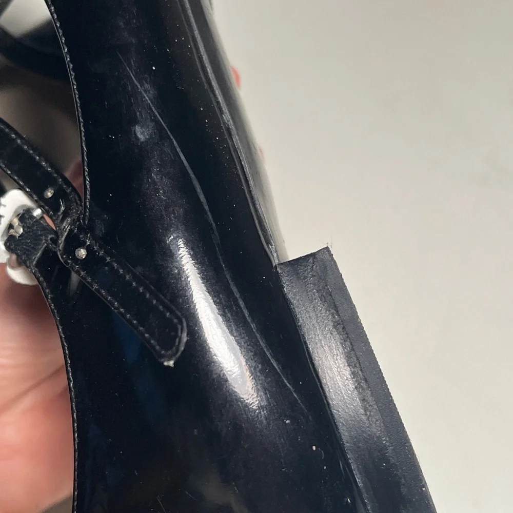 CHANEL Black Patent Leather Flats with Silver Floral Accents - Picture 14 of 14